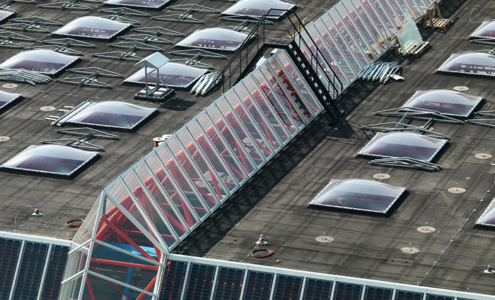 VELUX Commercial structural glazing replaced existing glass rooflights and façades.