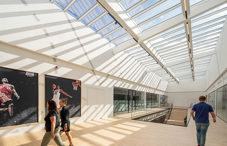 Interieur from Belgian office building with daylight coming through the VELUX Step Solution