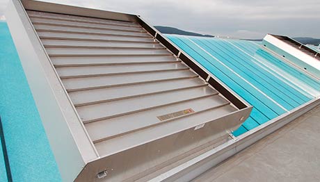 Grillodur vaulted continuous rooflight with louvered ventilation