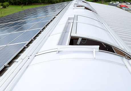Vario continuous rooflight with side-and-cross-beam-flaps
