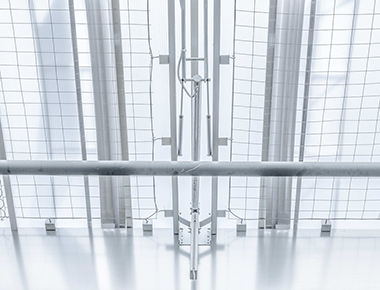 Rooflight safety and fall-through protection grid system for continuous rooflights