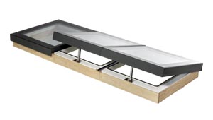 VELUX Modular Rooflight Linearlight module with chain actuator fully integrated in the upstand. No visible difference between fixed and venting modules.