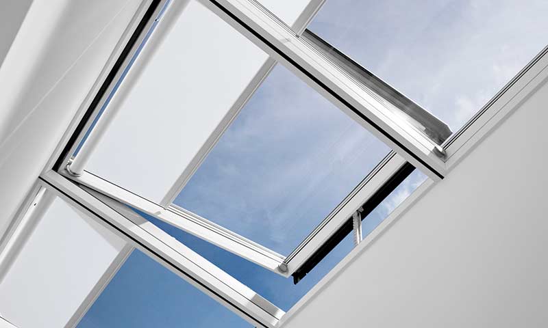Rooflight solution with prefabricated modules, flashings, integrated motor and white roller blinds
